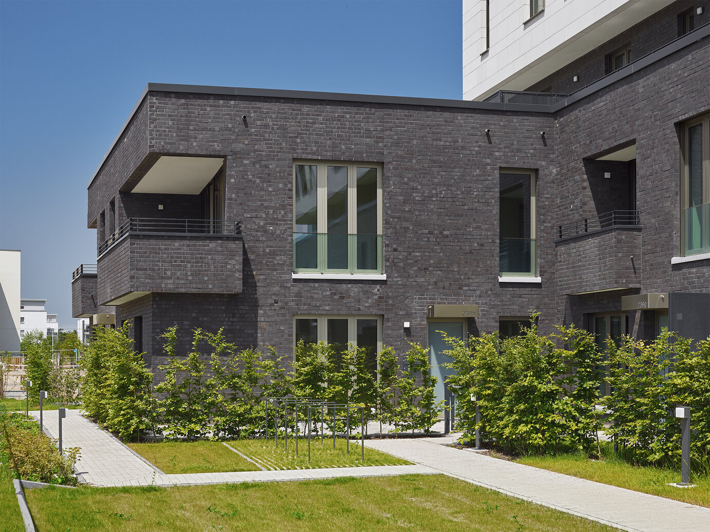 „Town-Houses“, Maisonettewohnungen mit privatem Garten